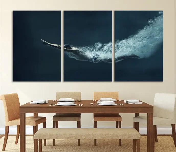 A set of three "Swimmer Wall Art Canvas Print" pieces enhances the wall. These gallery-wrapped artworks are printed on museum-quality canvas and are treated with a UV-protective coating for enduring vibrancy.