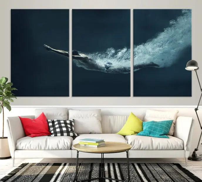 A set of three "Swimmer Wall Art Canvas Print" pieces enhances the wall. These gallery-wrapped artworks are printed on museum-quality canvas and are treated with a UV-protective coating for enduring vibrancy.