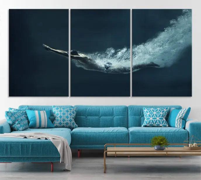 A set of three "Swimmer Wall Art Canvas Print" pieces enhances the wall. These gallery-wrapped artworks are printed on museum-quality canvas and are treated with a UV-protective coating for enduring vibrancy.