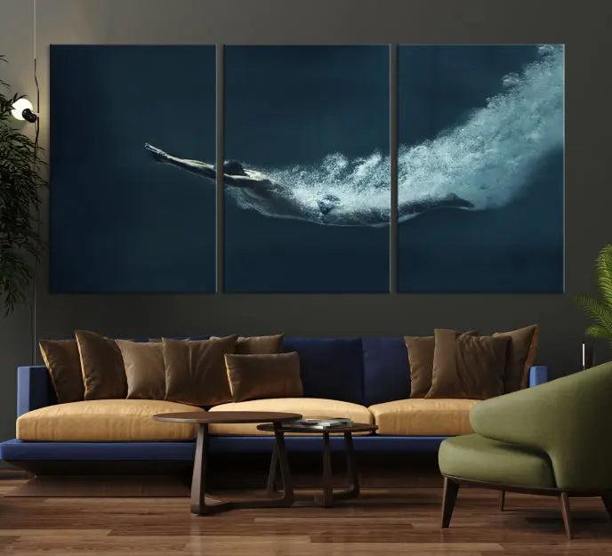 A set of three "Swimmer Wall Art Canvas Print" pieces enhances the wall. These gallery-wrapped artworks are printed on museum-quality canvas and are treated with a UV-protective coating for enduring vibrancy.