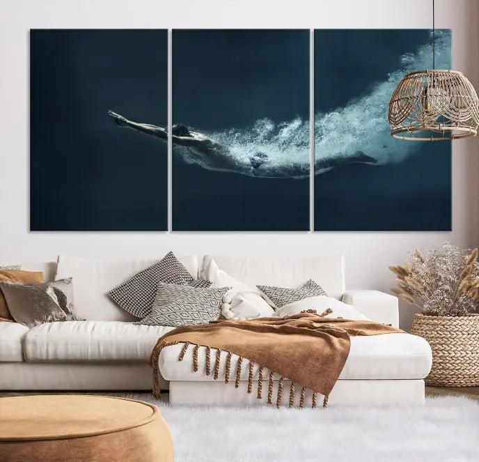 A set of three "Swimmer Wall Art Canvas Print" pieces enhances the wall. These gallery-wrapped artworks are printed on museum-quality canvas and are treated with a UV-protective coating for enduring vibrancy.