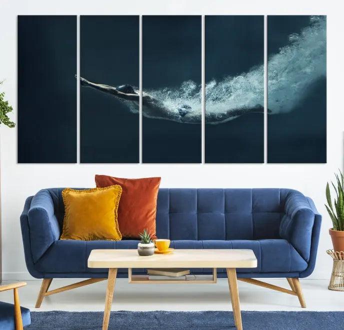 A set of three "Swimmer Wall Art Canvas Print" pieces enhances the wall. These gallery-wrapped artworks are printed on museum-quality canvas and are treated with a UV-protective coating for enduring vibrancy.