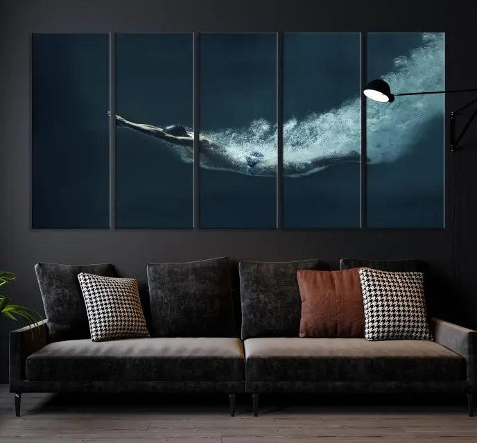 A set of three "Swimmer Wall Art Canvas Print" pieces enhances the wall. These gallery-wrapped artworks are printed on museum-quality canvas and are treated with a UV-protective coating for enduring vibrancy.