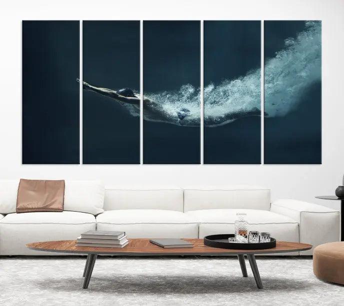 A set of three "Swimmer Wall Art Canvas Print" pieces enhances the wall. These gallery-wrapped artworks are printed on museum-quality canvas and are treated with a UV-protective coating for enduring vibrancy.