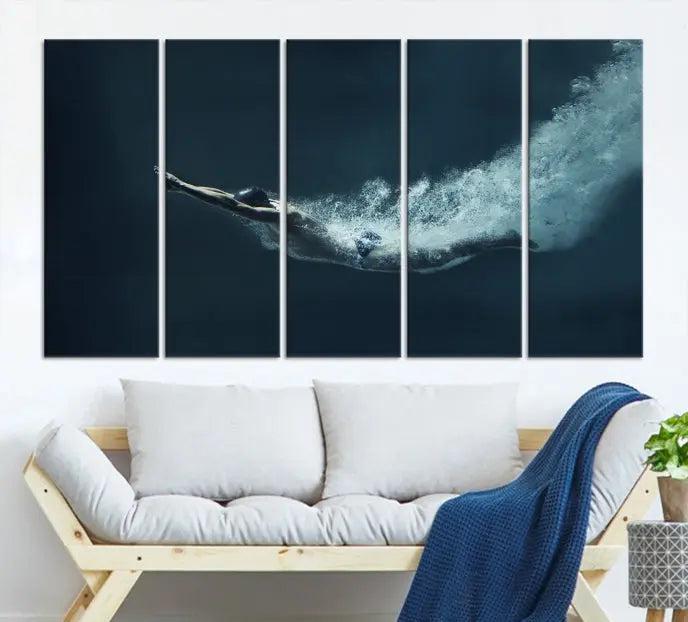 A set of three "Swimmer Wall Art Canvas Print" pieces enhances the wall. These gallery-wrapped artworks are printed on museum-quality canvas and are treated with a UV-protective coating for enduring vibrancy.