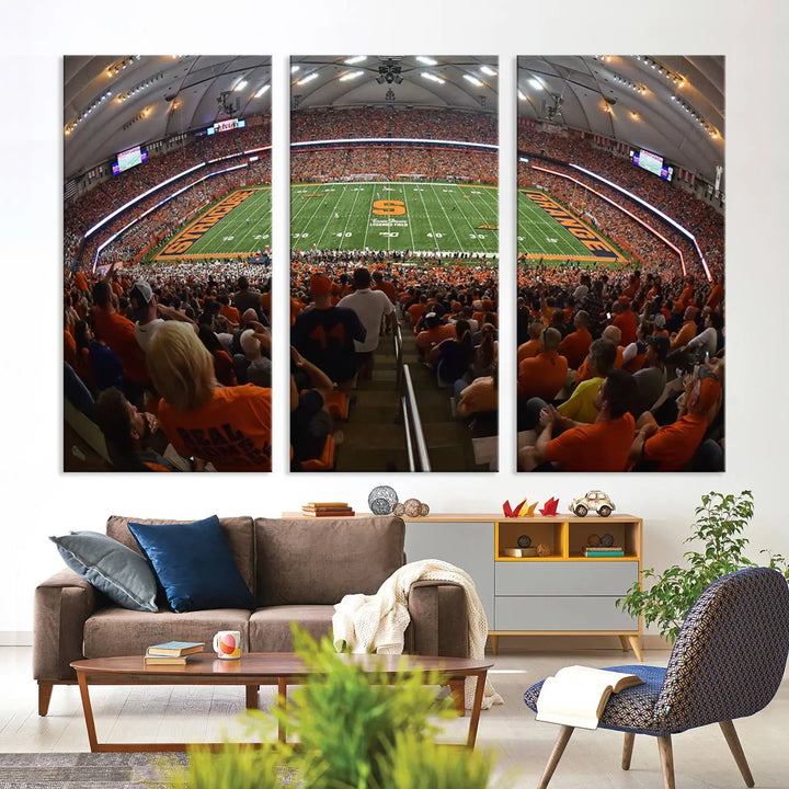 The Syracuse University Orange Football Team Print is a canvas wall art of the Syracuse JMA Wireless Dome, beautifully resembling a packed stadium with fans in orange and capturing the energy of the moment with a gallery-quality finish.