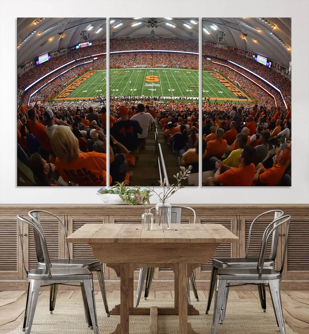 The Syracuse University Orange Football Team Print is a canvas wall art of the Syracuse JMA Wireless Dome, beautifully resembling a packed stadium with fans in orange and capturing the energy of the moment with a gallery-quality finish.