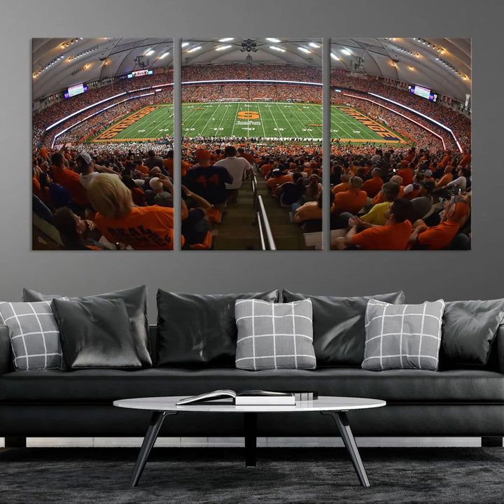 The Syracuse University Orange Football Team Print is a canvas wall art of the Syracuse JMA Wireless Dome, beautifully resembling a packed stadium with fans in orange and capturing the energy of the moment with a gallery-quality finish.