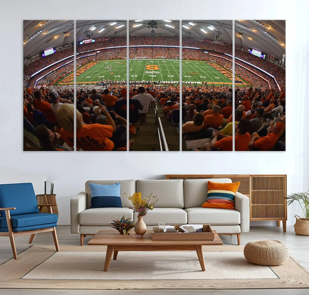 The Syracuse University Orange Football Team Print is a canvas wall art of the Syracuse JMA Wireless Dome, beautifully resembling a packed stadium with fans in orange and capturing the energy of the moment with a gallery-quality finish.