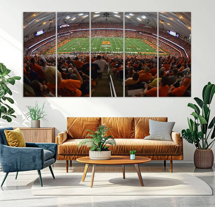 The Syracuse University Orange Football Team Print is a canvas wall art of the Syracuse JMA Wireless Dome, beautifully resembling a packed stadium with fans in orange and capturing the energy of the moment with a gallery-quality finish.