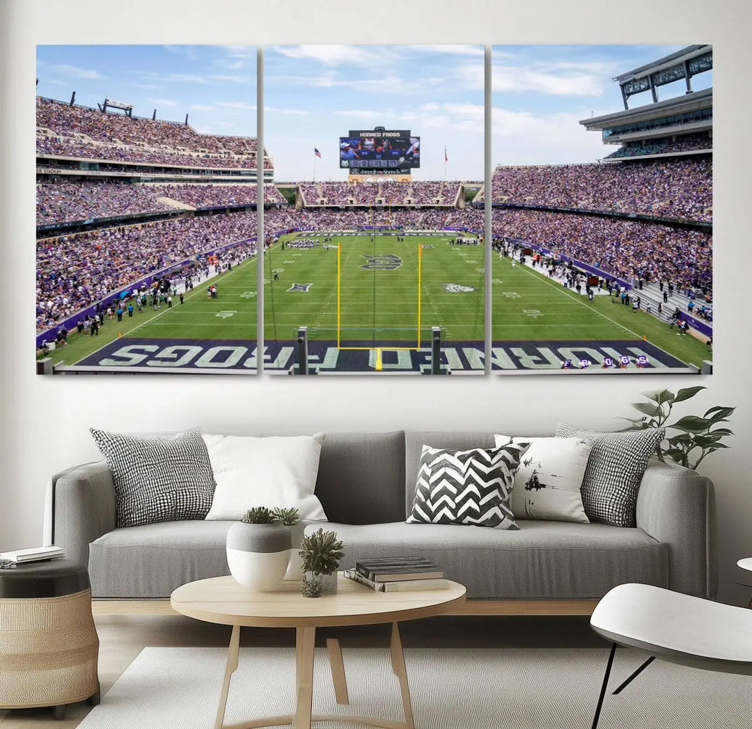 The living room showcases a triptych canvas artwork titled "TCU Horned Frogs Football Team Print - Fort Worth Amon G. Carter Stadium Wall Art Canvas Print," depicting a bustling football stadium and field under a clear blue sky in a gallery-quality finish.