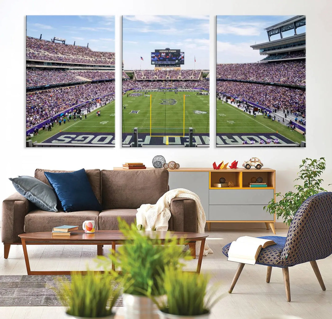 The living room showcases a triptych canvas artwork titled "TCU Horned Frogs Football Team Print - Fort Worth Amon G. Carter Stadium Wall Art Canvas Print," depicting a bustling football stadium and field under a clear blue sky in a gallery-quality finish.