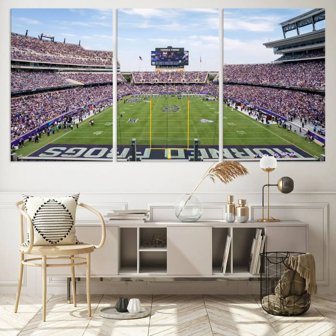 The living room showcases a triptych canvas artwork titled "TCU Horned Frogs Football Team Print - Fort Worth Amon G. Carter Stadium Wall Art Canvas Print," depicting a bustling football stadium and field under a clear blue sky in a gallery-quality finish.