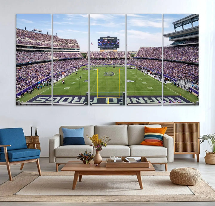 The living room showcases a triptych canvas artwork titled "TCU Horned Frogs Football Team Print - Fort Worth Amon G. Carter Stadium Wall Art Canvas Print," depicting a bustling football stadium and field under a clear blue sky in a gallery-quality finish.