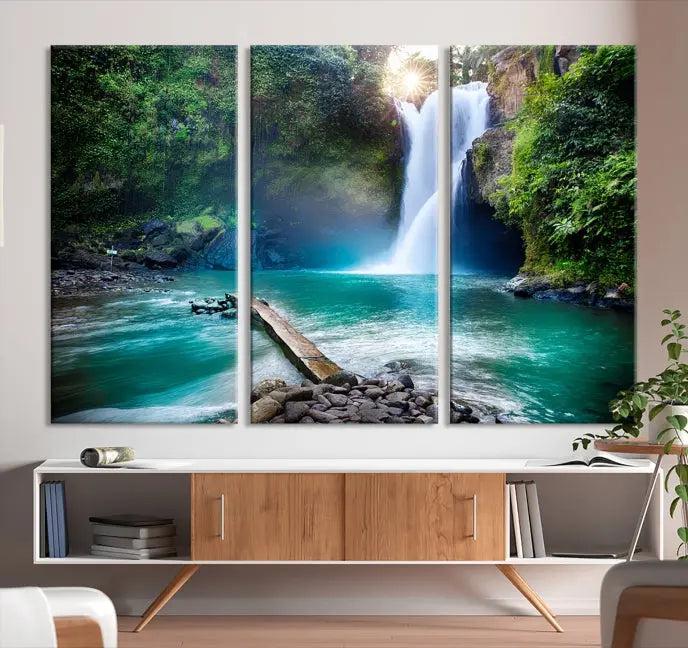 The "Tegenungan Waterfall" artwork, a serene scene printed on museum-quality polycotton canvas, decorates the living room. This UV-protective, ready-to-hang art piece is displayed gracefully above the sofa.