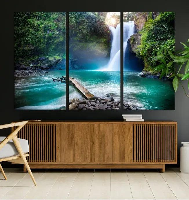 The "Tegenungan Waterfall" artwork, a serene scene printed on museum-quality polycotton canvas, decorates the living room. This UV-protective, ready-to-hang art piece is displayed gracefully above the sofa.