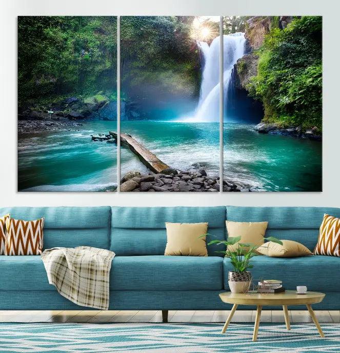 The "Tegenungan Waterfall" artwork, a serene scene printed on museum-quality polycotton canvas, decorates the living room. This UV-protective, ready-to-hang art piece is displayed gracefully above the sofa.