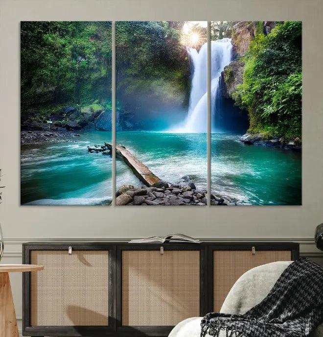 The "Tegenungan Waterfall" artwork, a serene scene printed on museum-quality polycotton canvas, decorates the living room. This UV-protective, ready-to-hang art piece is displayed gracefully above the sofa.