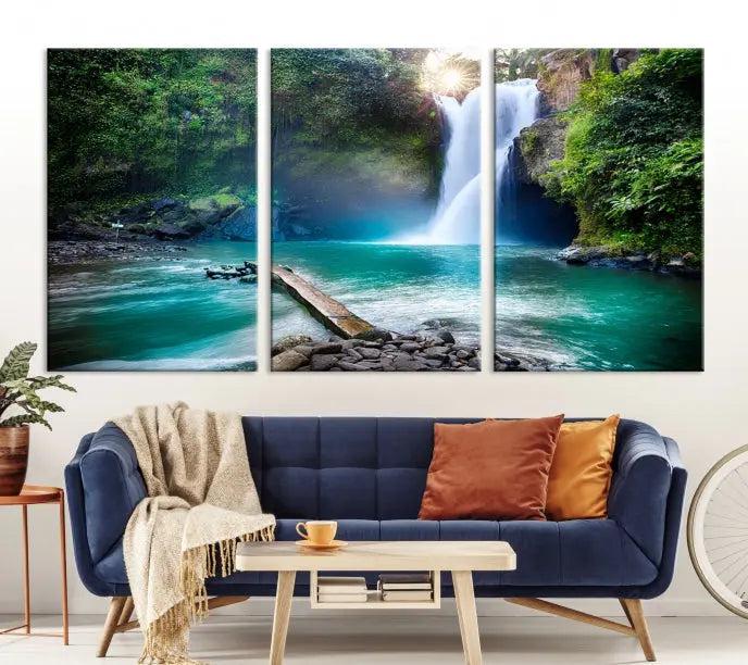 The "Tegenungan Waterfall" artwork, a serene scene printed on museum-quality polycotton canvas, decorates the living room. This UV-protective, ready-to-hang art piece is displayed gracefully above the sofa.