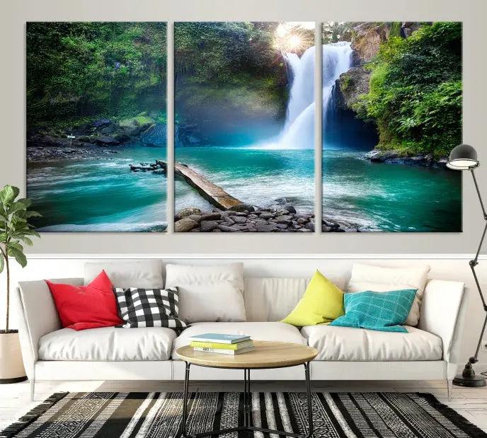 The "Tegenungan Waterfall" artwork, a serene scene printed on museum-quality polycotton canvas, decorates the living room. This UV-protective, ready-to-hang art piece is displayed gracefully above the sofa.