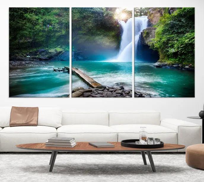 The "Tegenungan Waterfall" artwork, a serene scene printed on museum-quality polycotton canvas, decorates the living room. This UV-protective, ready-to-hang art piece is displayed gracefully above the sofa.