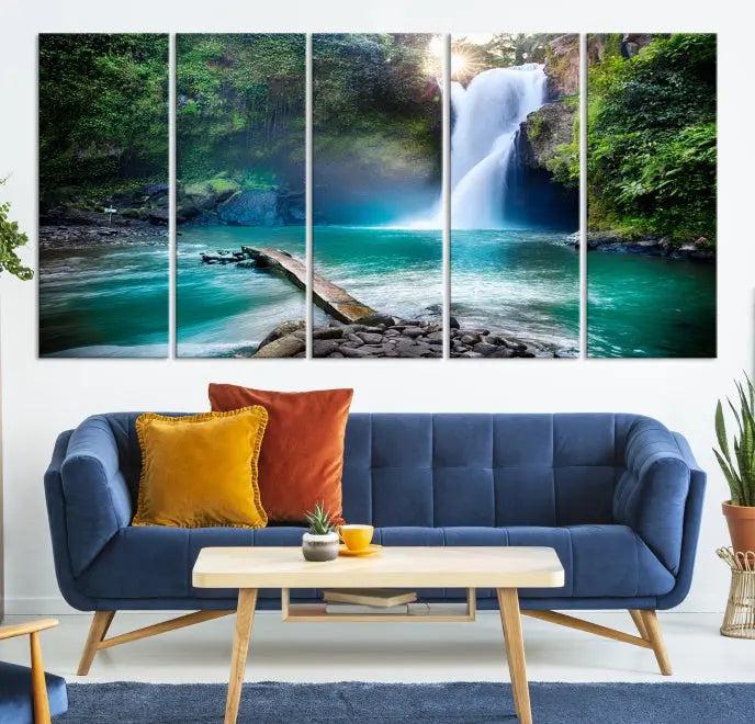 The "Tegenungan Waterfall" artwork, a serene scene printed on museum-quality polycotton canvas, decorates the living room. This UV-protective, ready-to-hang art piece is displayed gracefully above the sofa.