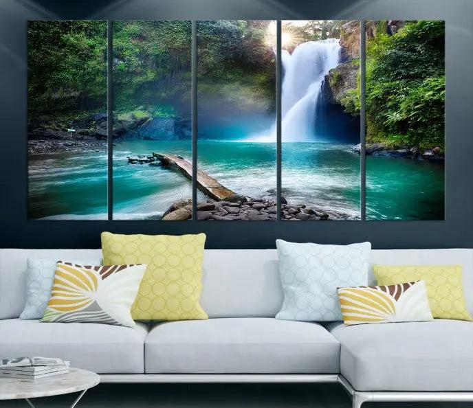 The "Tegenungan Waterfall" artwork, a serene scene printed on museum-quality polycotton canvas, decorates the living room. This UV-protective, ready-to-hang art piece is displayed gracefully above the sofa.