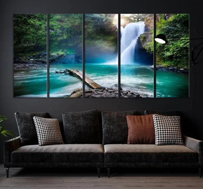 The "Tegenungan Waterfall" artwork, a serene scene printed on museum-quality polycotton canvas, decorates the living room. This UV-protective, ready-to-hang art piece is displayed gracefully above the sofa.