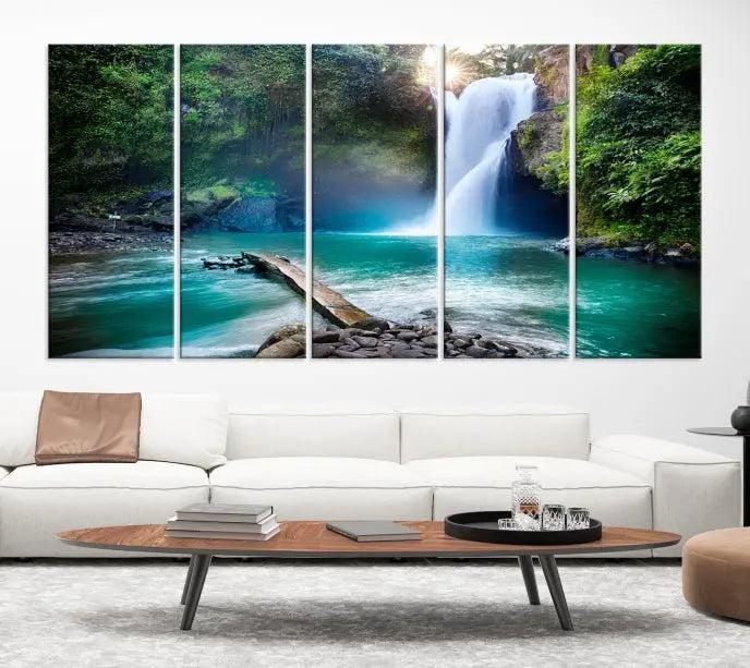 The "Tegenungan Waterfall" artwork, a serene scene printed on museum-quality polycotton canvas, decorates the living room. This UV-protective, ready-to-hang art piece is displayed gracefully above the sofa.