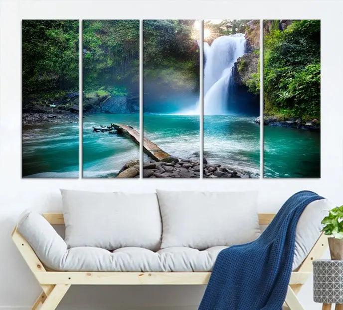 The "Tegenungan Waterfall" artwork, a serene scene printed on museum-quality polycotton canvas, decorates the living room. This UV-protective, ready-to-hang art piece is displayed gracefully above the sofa.