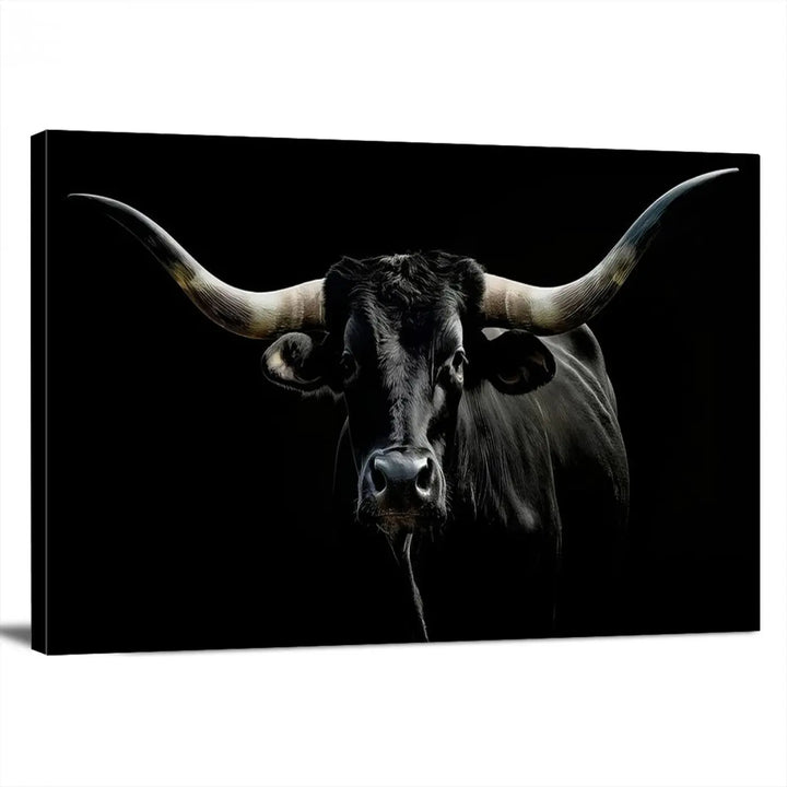 This sophisticated Texas Black Longhorn Bull Wall Art Canvas Print serves as an impressive triptych piece. The vivid depiction of the Western Texas cattle against the dark background enhances the elegance and boldness of the space.