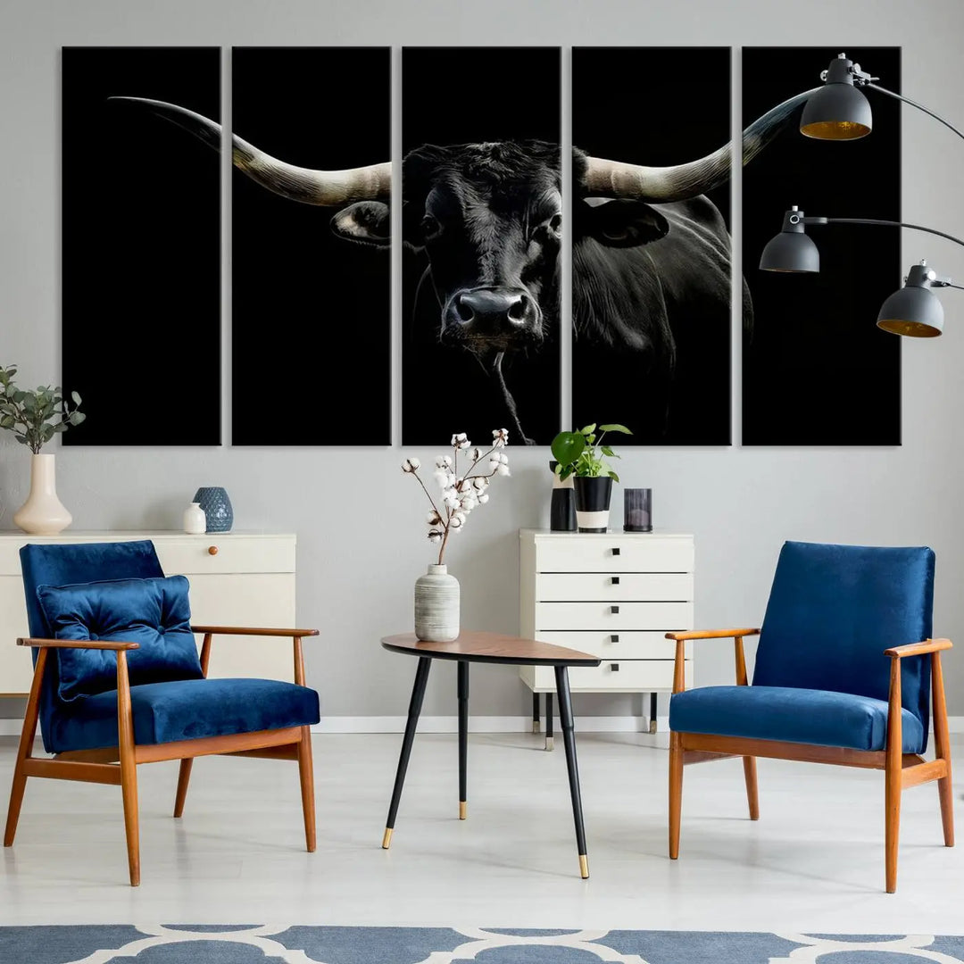 This sophisticated Texas Black Longhorn Bull Wall Art Canvas Print serves as an impressive triptych piece. The vivid depiction of the Western Texas cattle against the dark background enhances the elegance and boldness of the space.