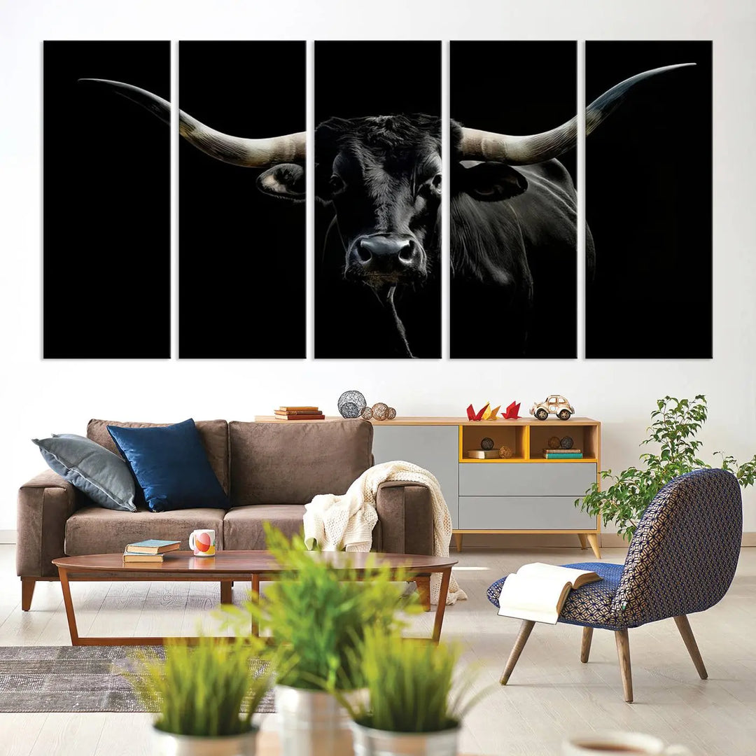 This sophisticated Texas Black Longhorn Bull Wall Art Canvas Print serves as an impressive triptych piece. The vivid depiction of the Western Texas cattle against the dark background enhances the elegance and boldness of the space.