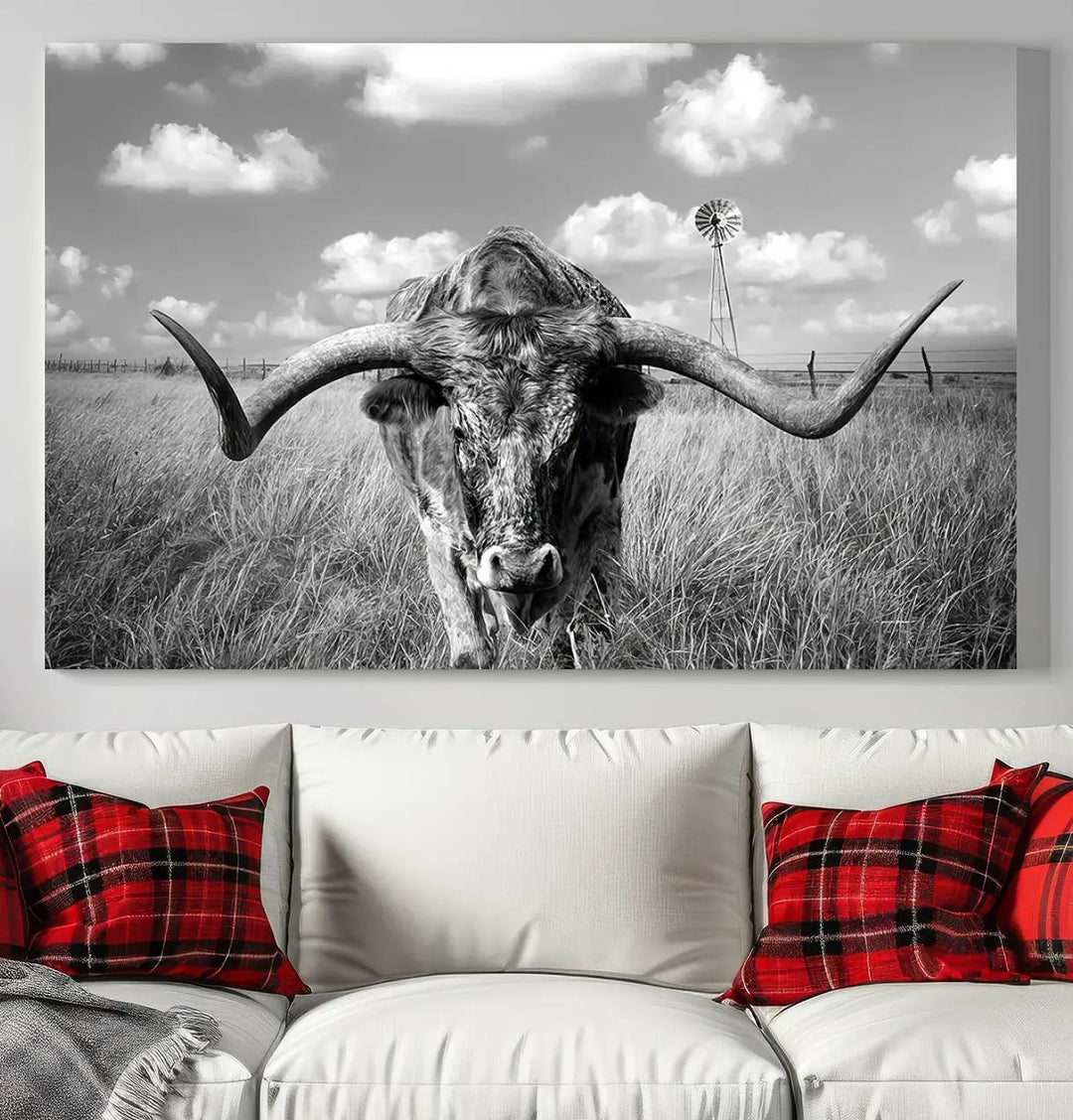 The Texas Cow Longhorn Wall Art Canvas Print features a black and white triptych of a longhorn steer in a grassy field, rendered with high-resolution clarity on museum quality canvas.