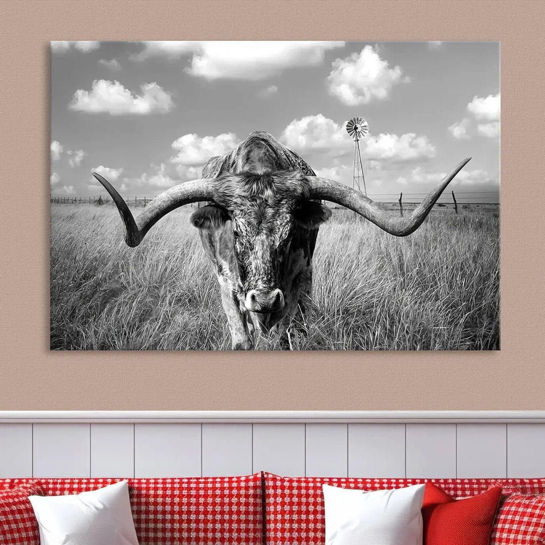 The Texas Cow Longhorn Wall Art Canvas Print features a black and white triptych of a longhorn steer in a grassy field, rendered with high-resolution clarity on museum quality canvas.