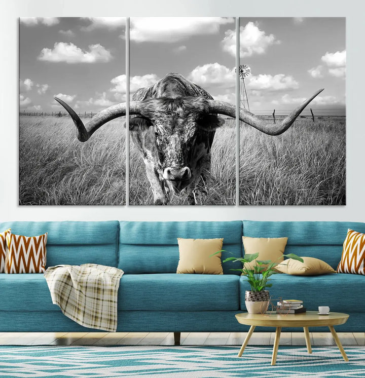 The Texas Cow Longhorn Wall Art Canvas Print features a black and white triptych of a longhorn steer in a grassy field, rendered with high-resolution clarity on museum quality canvas.