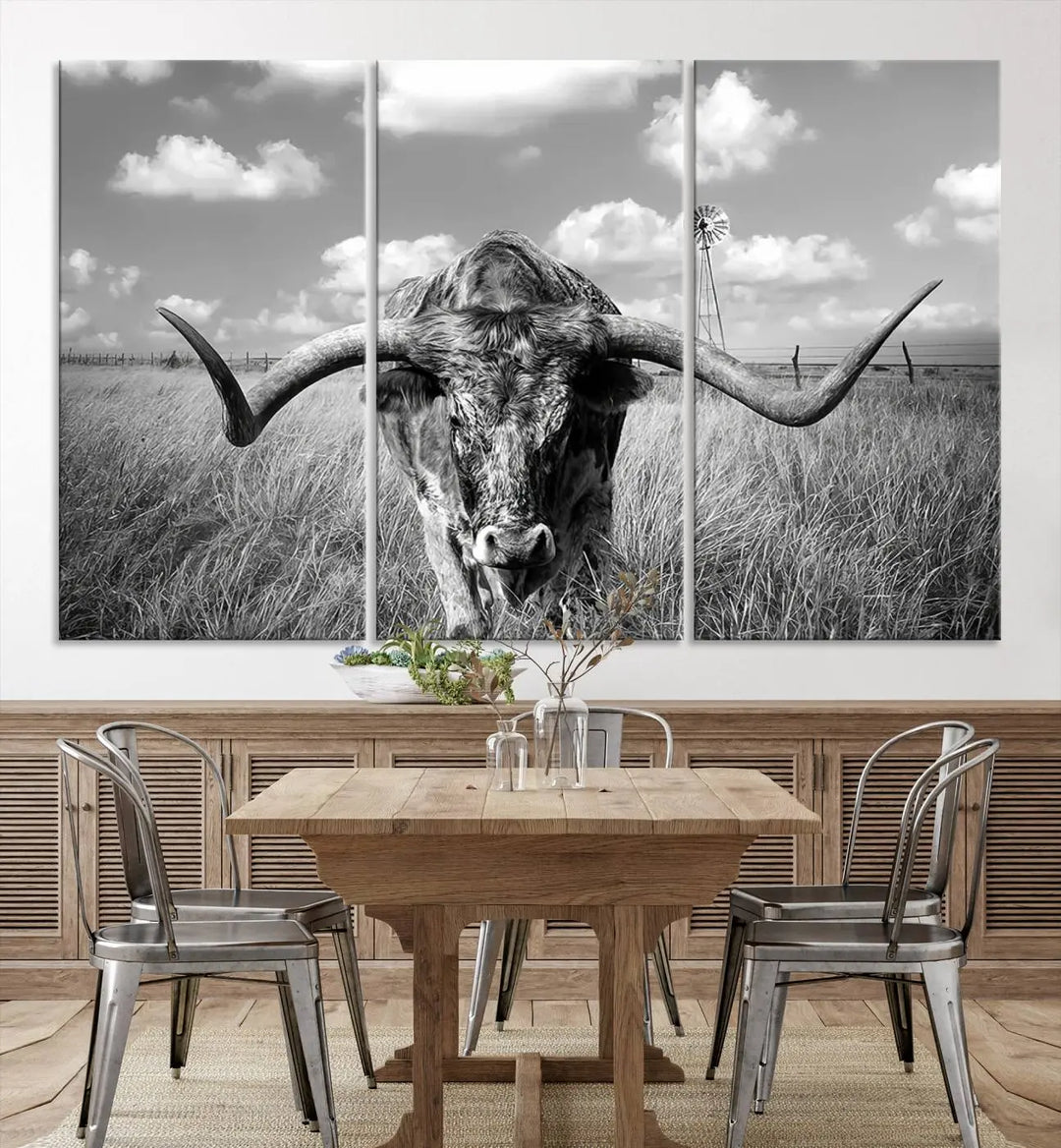 The Texas Cow Longhorn Wall Art Canvas Print features a black and white triptych of a longhorn steer in a grassy field, rendered with high-resolution clarity on museum quality canvas.