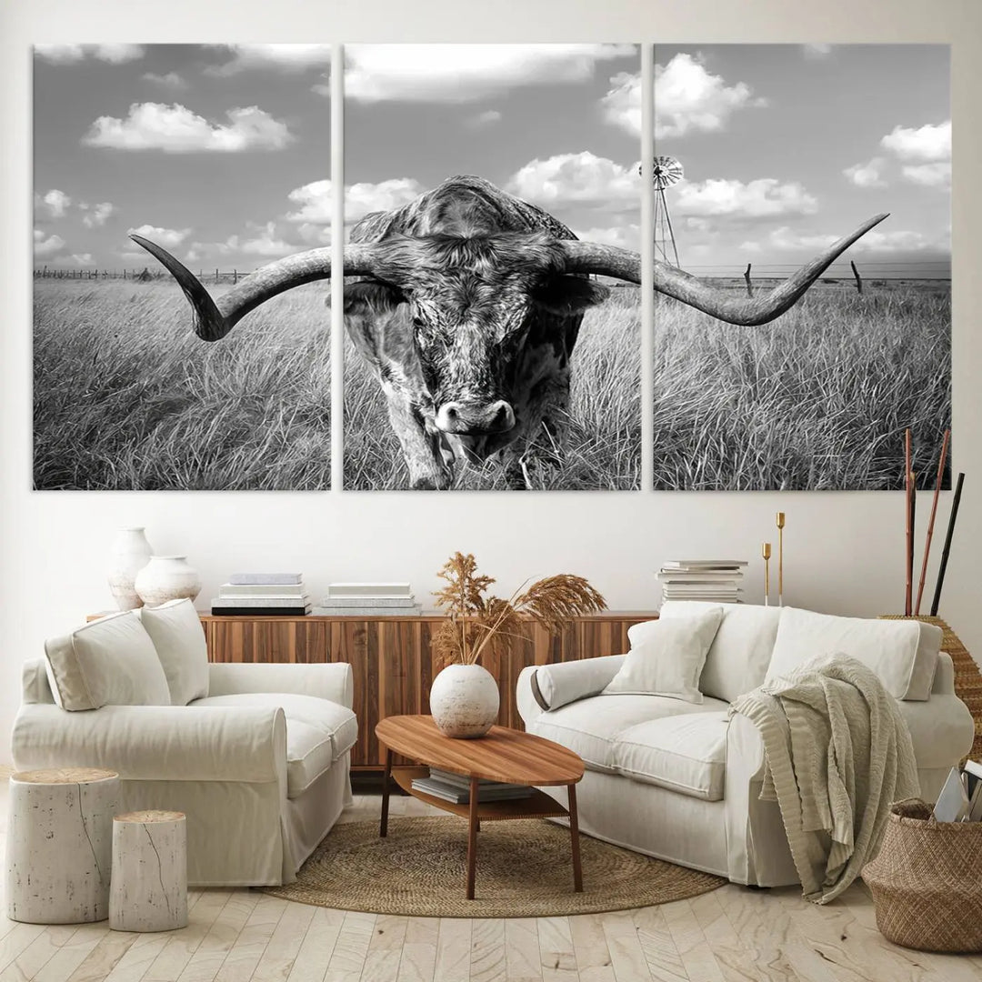 The Texas Cow Longhorn Wall Art Canvas Print features a black and white triptych of a longhorn steer in a grassy field, rendered with high-resolution clarity on museum quality canvas.