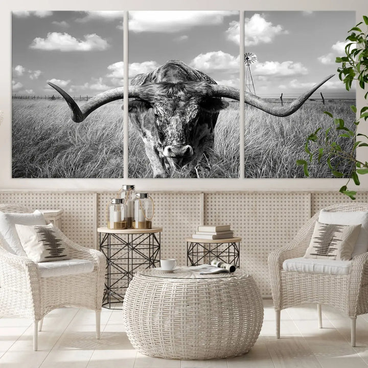 The Texas Cow Longhorn Wall Art Canvas Print features a black and white triptych of a longhorn steer in a grassy field, rendered with high-resolution clarity on museum quality canvas.