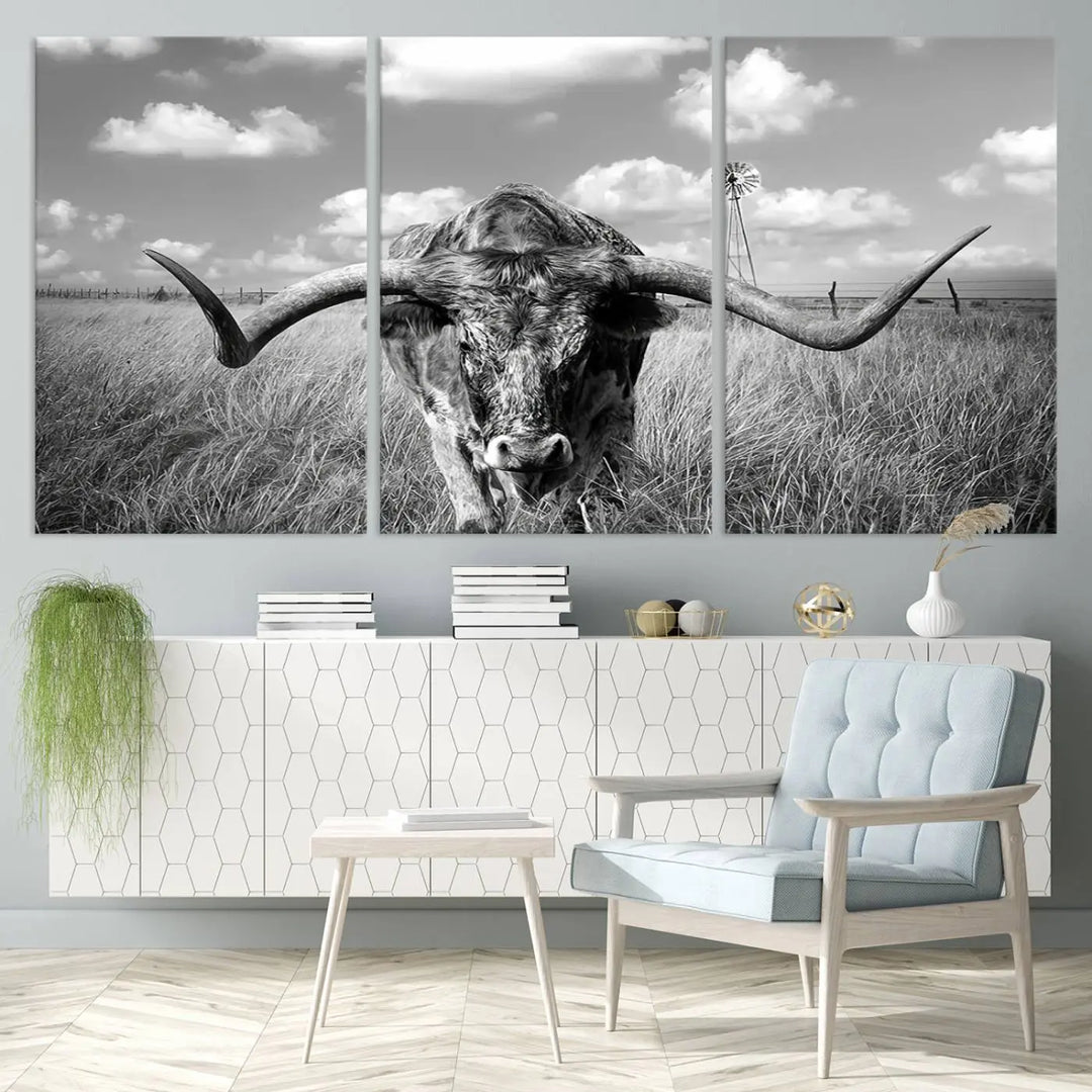 The Texas Cow Longhorn Wall Art Canvas Print features a black and white triptych of a longhorn steer in a grassy field, rendered with high-resolution clarity on museum quality canvas.