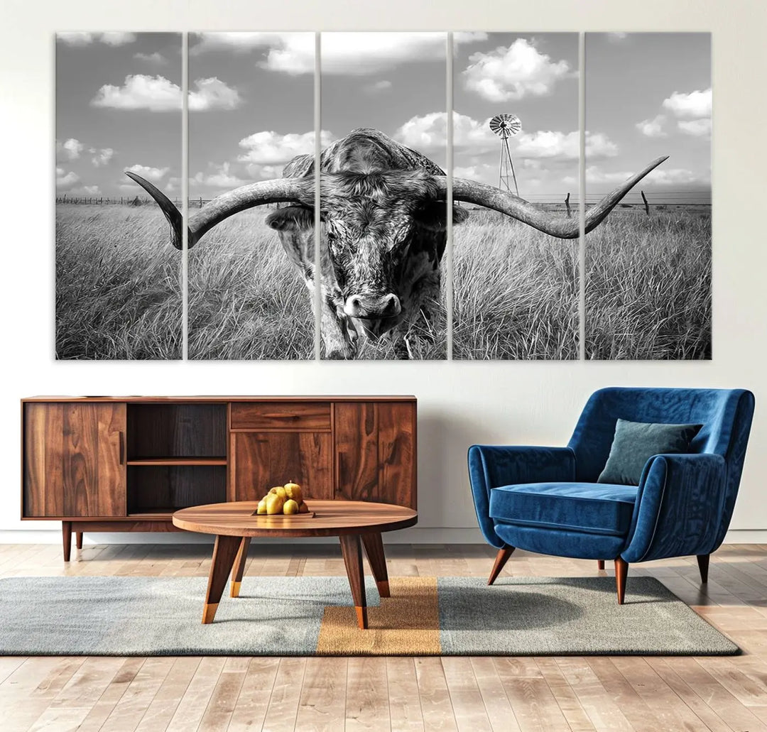 The Texas Cow Longhorn Wall Art Canvas Print features a black and white triptych of a longhorn steer in a grassy field, rendered with high-resolution clarity on museum quality canvas.