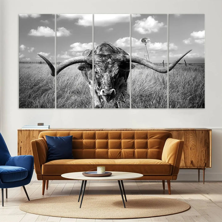 The Texas Cow Longhorn Wall Art Canvas Print features a black and white triptych of a longhorn steer in a grassy field, rendered with high-resolution clarity on museum quality canvas.