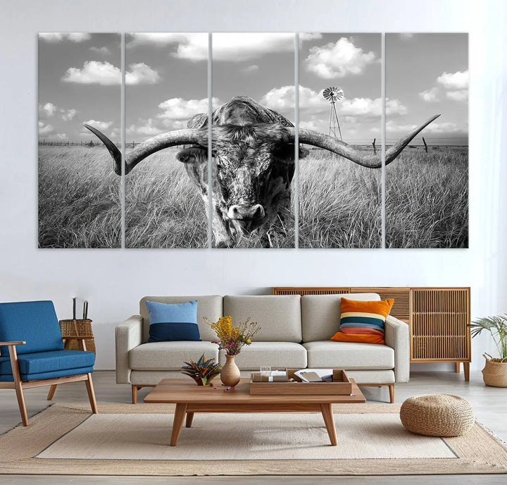 The Texas Cow Longhorn Wall Art Canvas Print features a black and white triptych of a longhorn steer in a grassy field, rendered with high-resolution clarity on museum quality canvas.