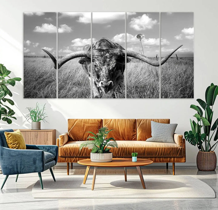 The Texas Cow Longhorn Wall Art Canvas Print features a black and white triptych of a longhorn steer in a grassy field, rendered with high-resolution clarity on museum quality canvas.