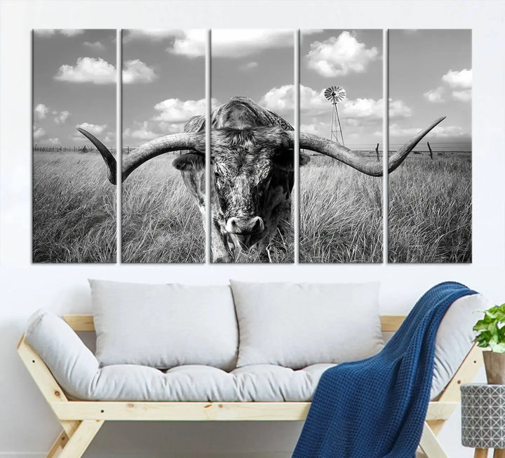 The Texas Cow Longhorn Wall Art Canvas Print features a black and white triptych of a longhorn steer in a grassy field, rendered with high-resolution clarity on museum quality canvas.