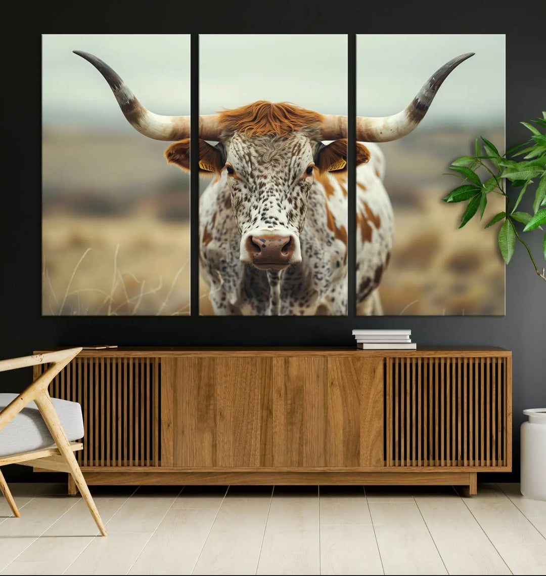 The Texas Cow Longhorn Wall Art Canvas Print for Farm House Wall Decor brings a rustic touch to the black wall.