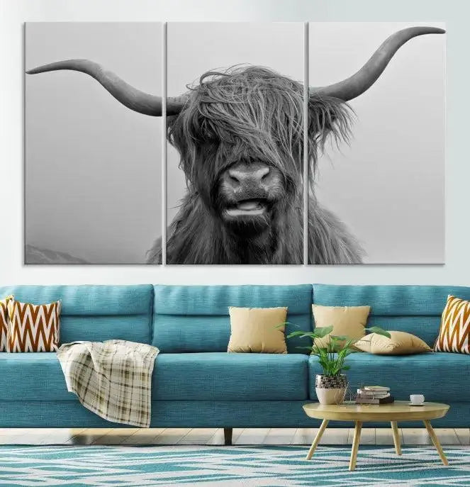 Texas Cow Wall Art Canvas Print in black and white, featuring a long-horned Highland cow, printed on museum-quality canvas with UV protection. It's perfect for enhancing any sophisticated space.