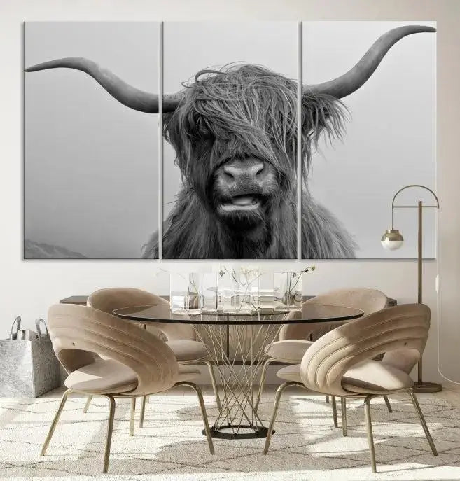 Texas Cow Wall Art Canvas Print in black and white, featuring a long-horned Highland cow, printed on museum-quality canvas with UV protection. It's perfect for enhancing any sophisticated space.