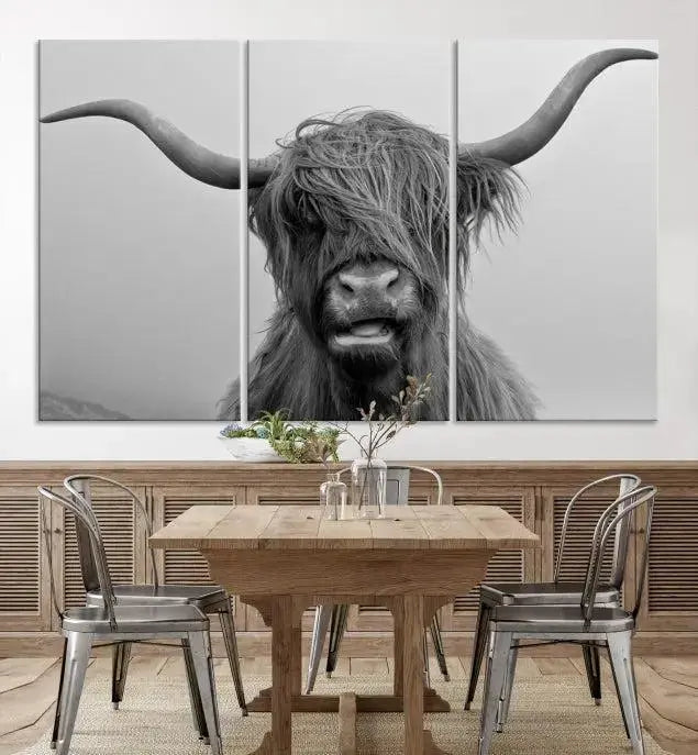 Texas Cow Wall Art Canvas Print in black and white, featuring a long-horned Highland cow, printed on museum-quality canvas with UV protection. It's perfect for enhancing any sophisticated space.