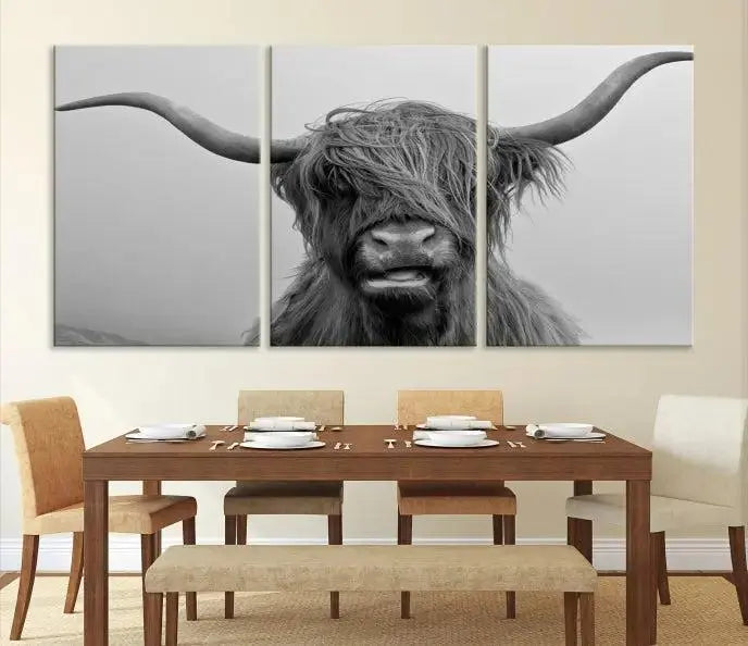 Texas Cow Wall Art Canvas Print in black and white, featuring a long-horned Highland cow, printed on museum-quality canvas with UV protection. It's perfect for enhancing any sophisticated space.